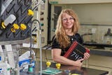 photo of wman smiling in technical facility