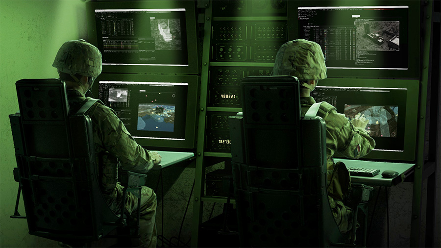 two soldiers at a computer terminal