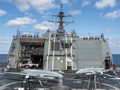 VTOL aircraft on deck of a Navy ship