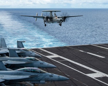 naval aircraft landing on carrier deck