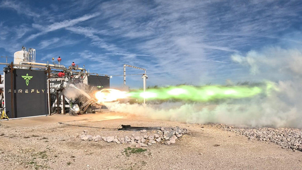rocket engine test with green flames shooting out