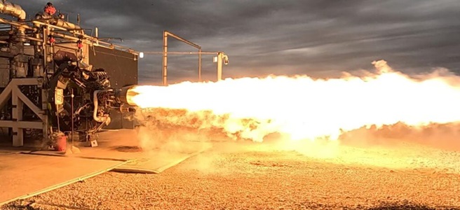 rocket engine test with flames shooting out