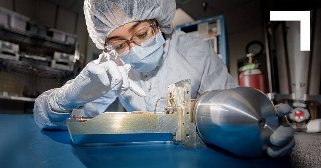 woman engineer working on a cryocooler