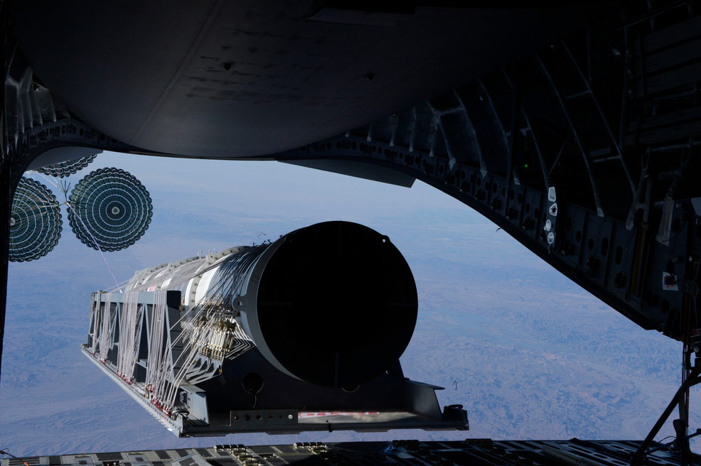 mission payload off the back of a transport aircraft