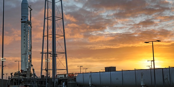 A beautiful evening sunset and the Antares Rocket on launchpad in Wallops Island, Virginia as it prepares for launch to Space.