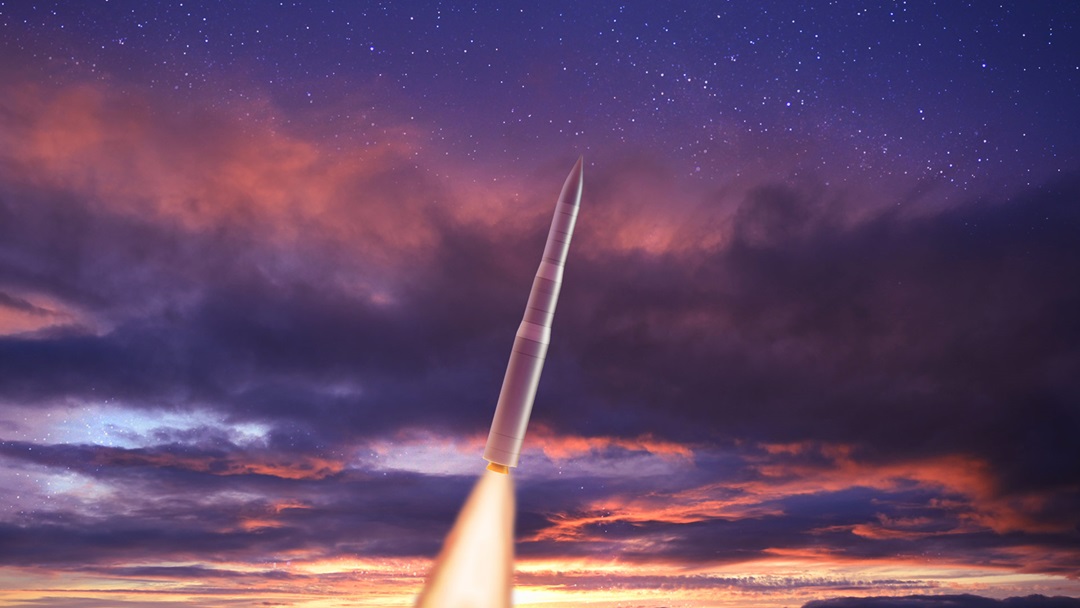 Image of Sentinel in clouds at sunset. 