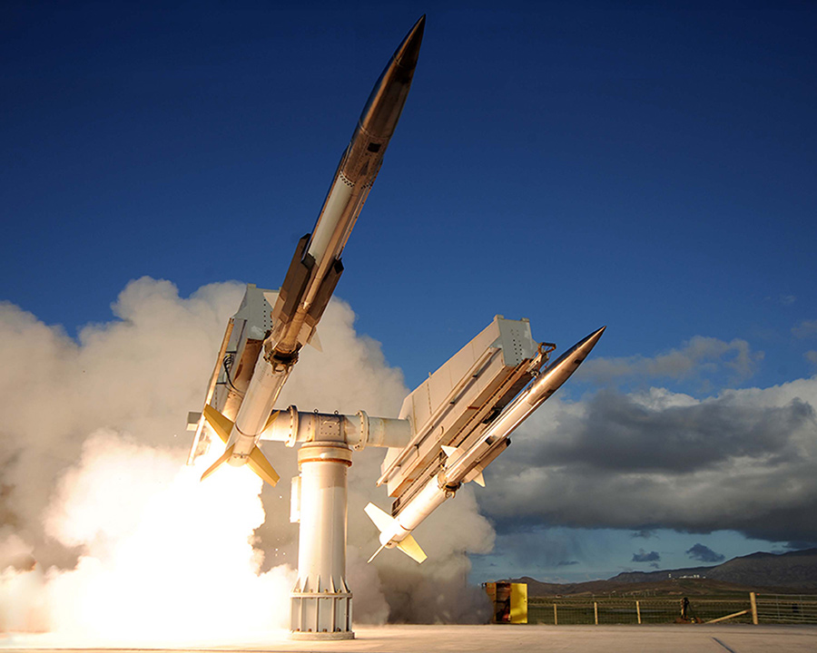 Proven-Portfolio-Tailored-to-Customer-Requirements two missiles being launched from earth