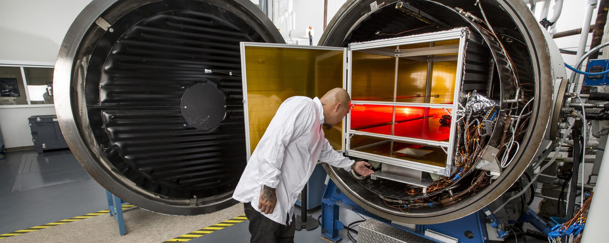 Man in white shirt testing equipment