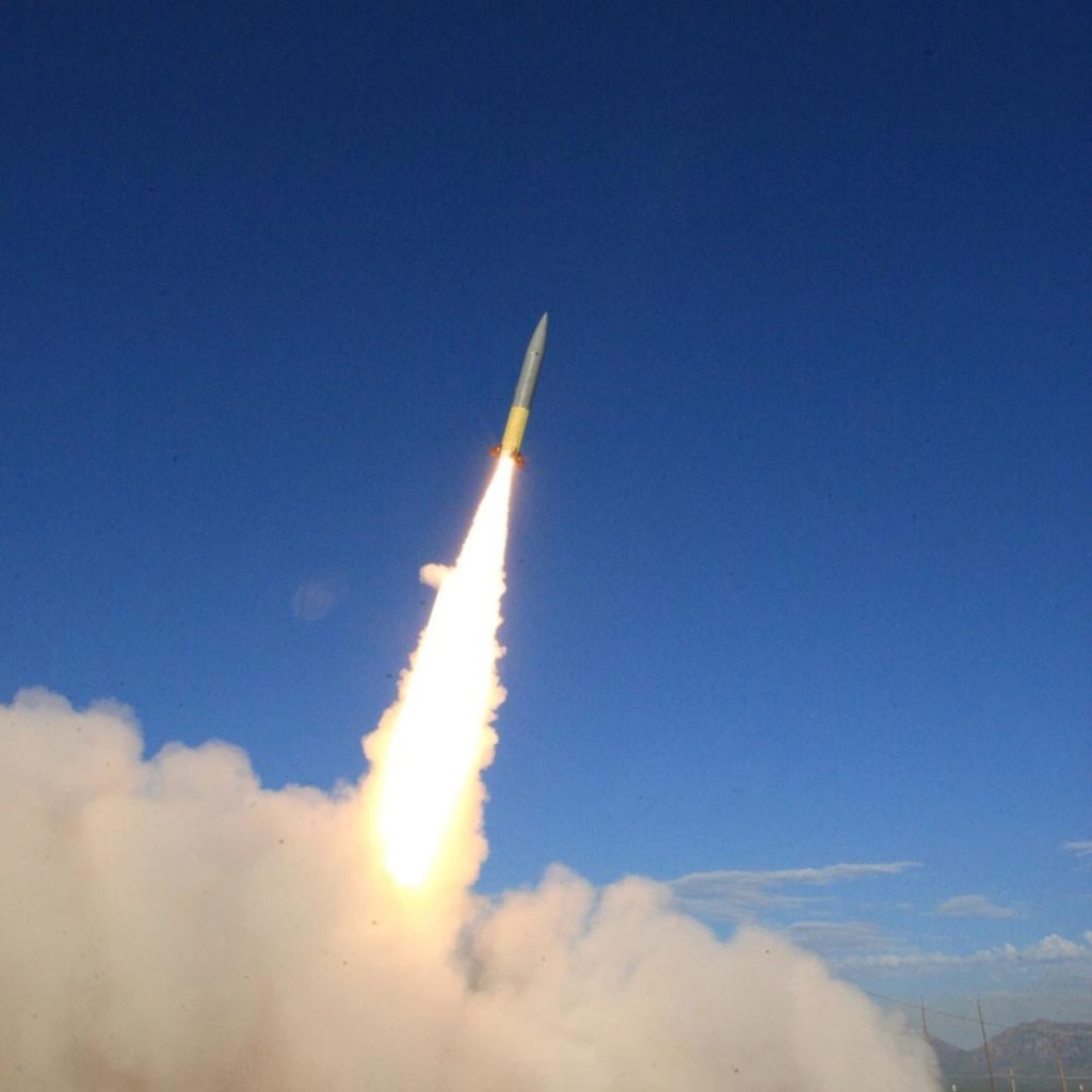 missile launching into blue sky