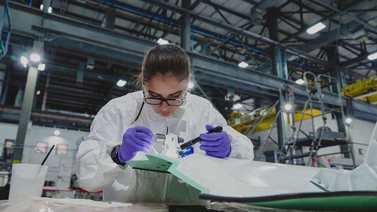 female engineer working on component