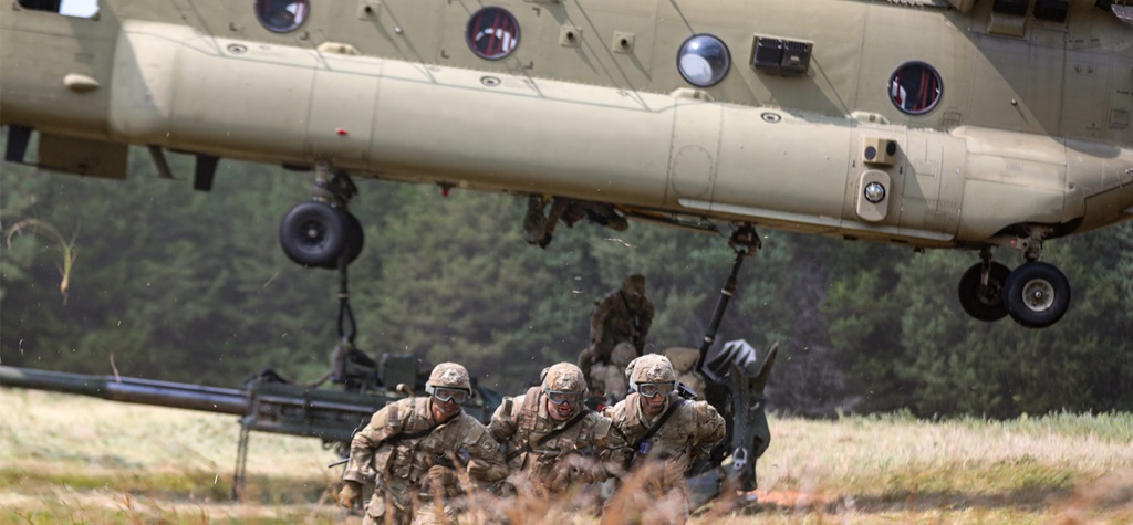 82nd Airborne Division Paratroopers Participate in Air Assault soldiers conducting conduct sling load operations from helicopter