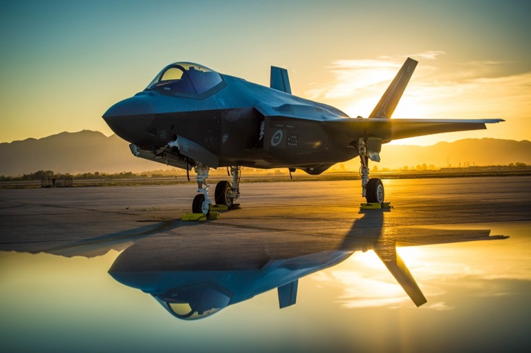F-35-Program-Hallmarks- fighter jet on the ground at sunset