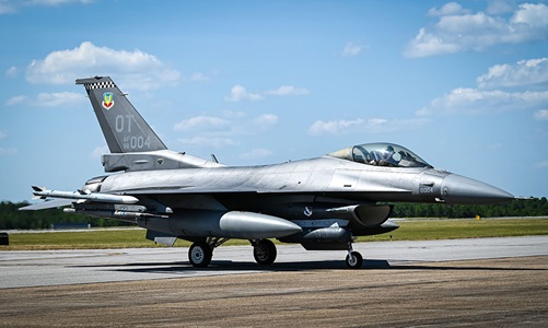 F-16 taxies after flying with the electronic warfare suite for first time