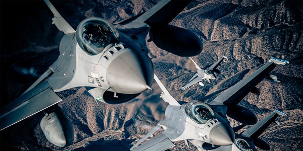 F-16's in air over mountains