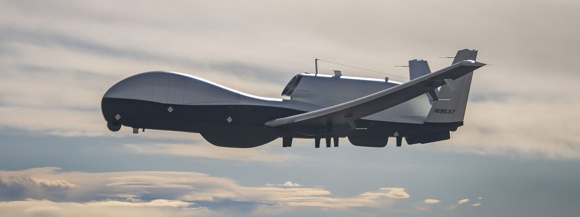 Triton flying above clouds