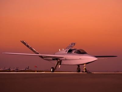 aircraft on runway at sunset