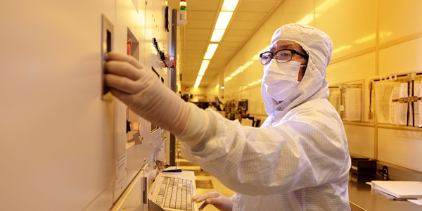 photo of person in clean lab clothes