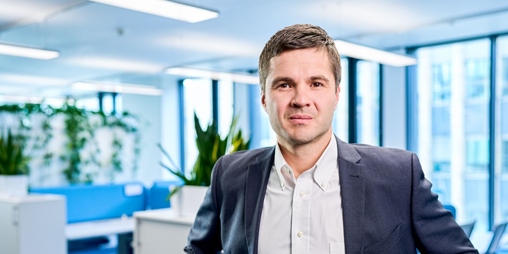 man wearing suit in office