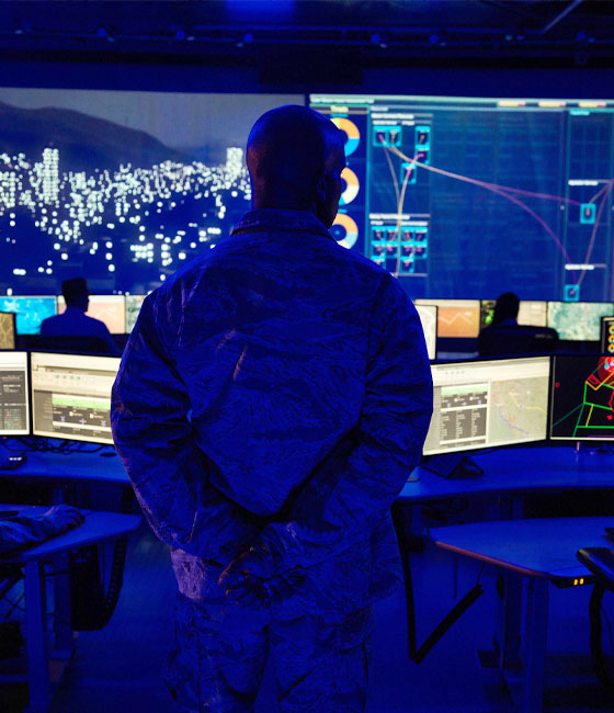 Military Man in dark command room