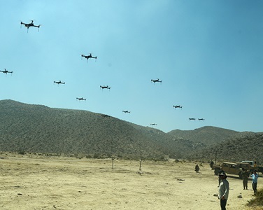 a flock of drones flying