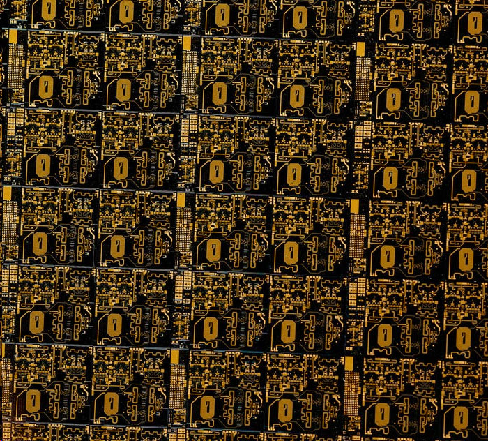 close-up of wafer containing hundreds of microchips
