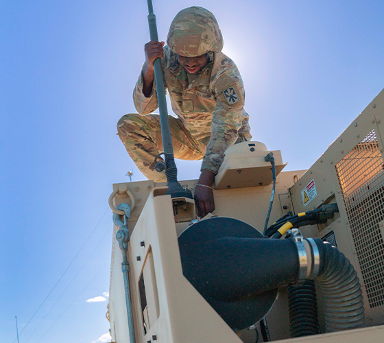person in uniform on a machine