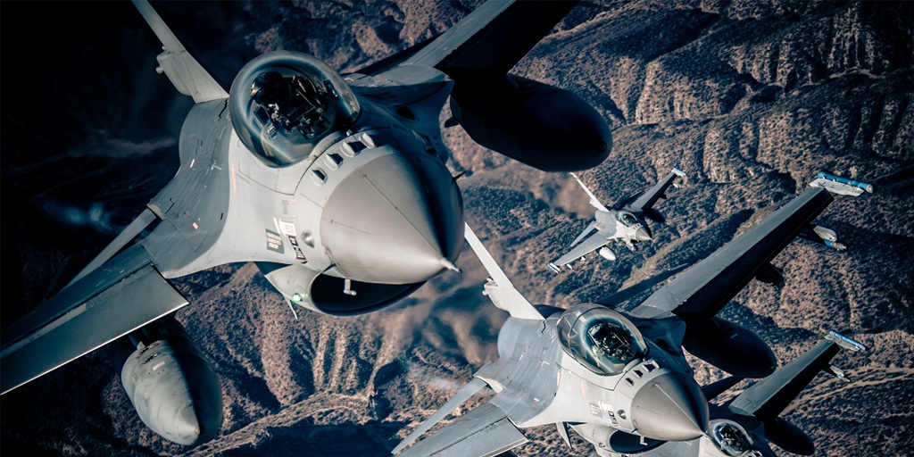 Northrop Grumman F-16 Electronic Warfare Suite F-16's in air over mountains