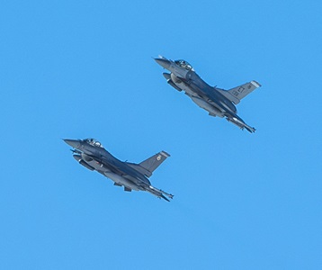 Integrated Viper Electronic Warfare Suite (IVEWS) two f-16 flying in blue sky