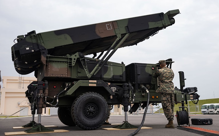 marine setting up ground-to-air radar