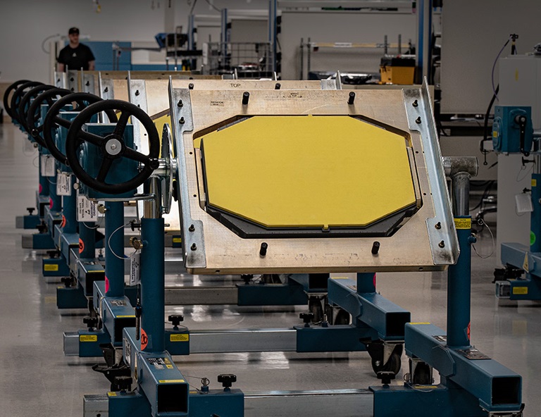 SABR (Scalable Agile Beam Radar) APG-83 AESA AESA fire control radars lined up in manufacturing facility