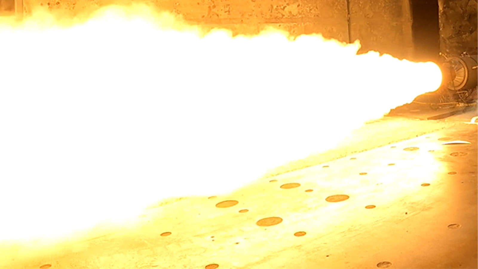 flames from the First Highly Loaded Grain Solid Rocket Motor test