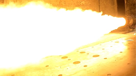 flames from the First Highly Loaded Grain Solid Rocket Motor test