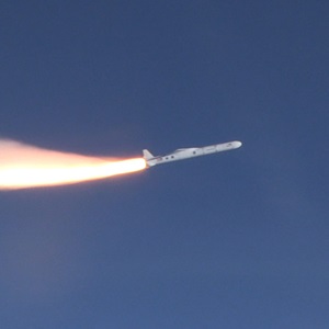 Pegasus rocket flying through blue skies