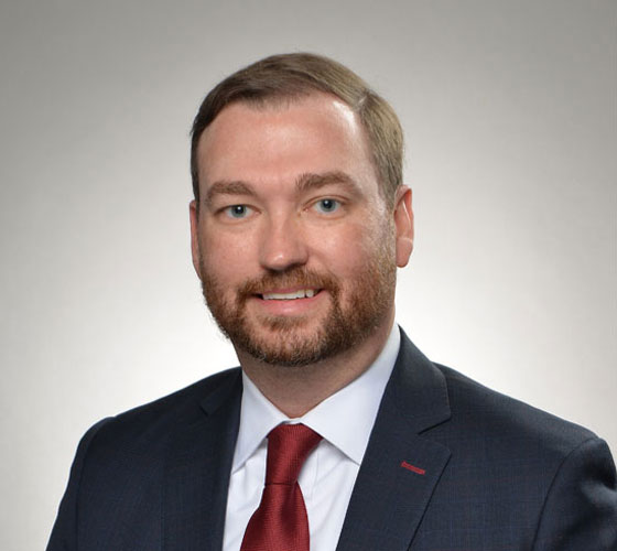 Image of smiling man in suit, who is Ken Crews, Corporate Vice President and Chief Financial Officer, Northrop Grumman Corporation