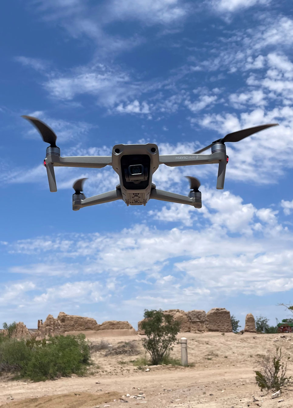 Drone in flight with Ft. Seldon in the background. 