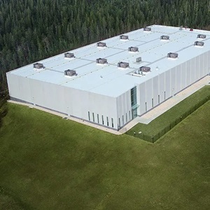 white building near green grass