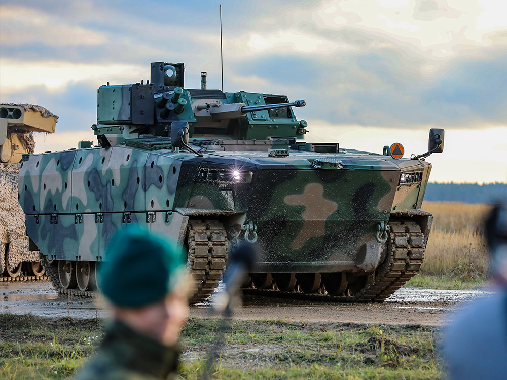 military tank with chain gun