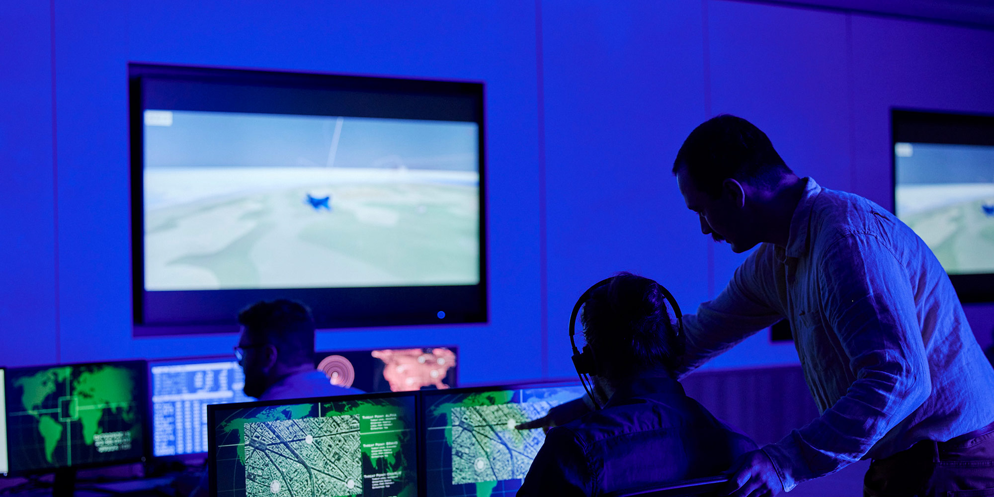 Northrop Grumman Australian employees working on computer.