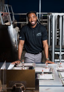 engineer standing at desk