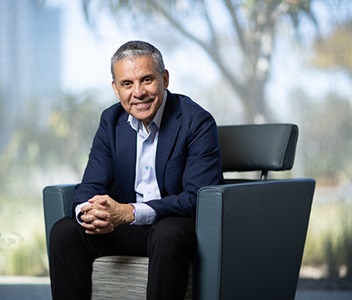 male sitting in chair