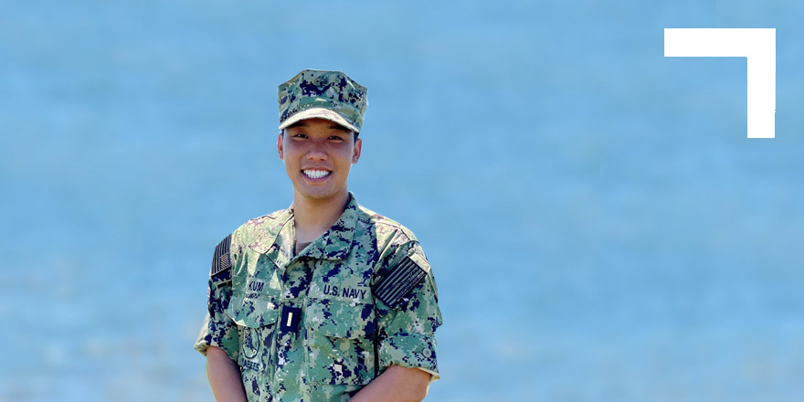 Male, US Sailor smiling.