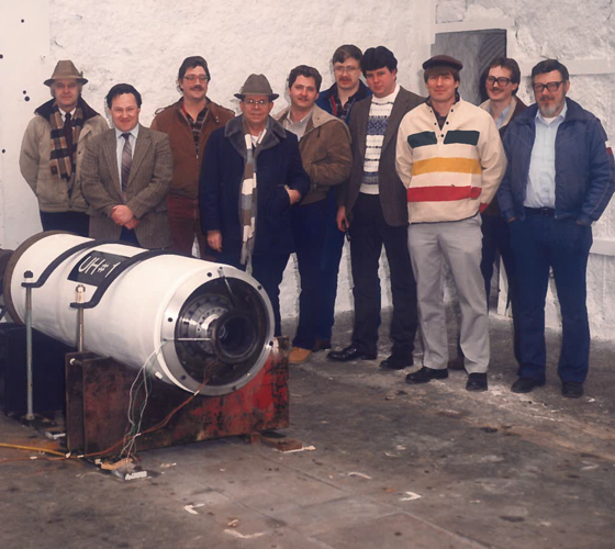 vintage photo of team with their first project