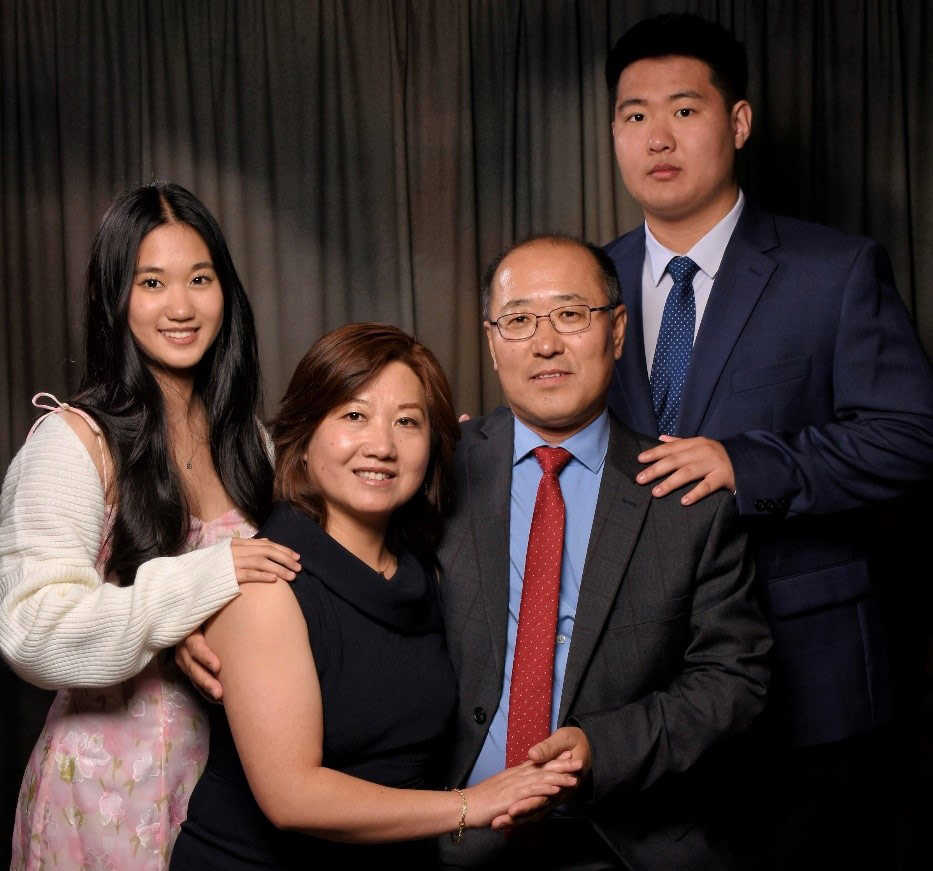 The Process for Precision Group photo featuring individuals in professional attire, highlighting collaboration and teamwork in a formal setting.