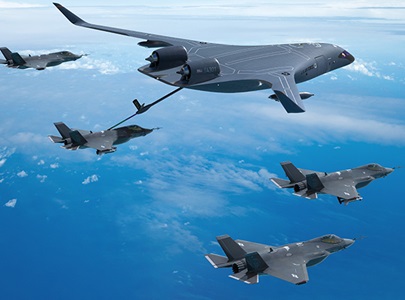 tanker aircraft refueling fighter jets over ocean