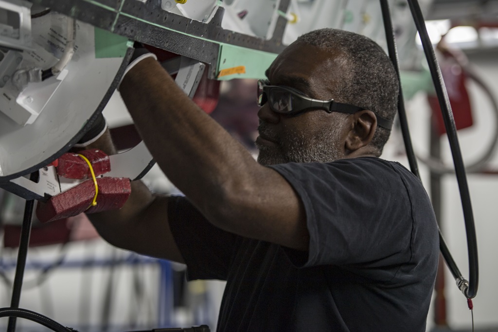 african american male working on product