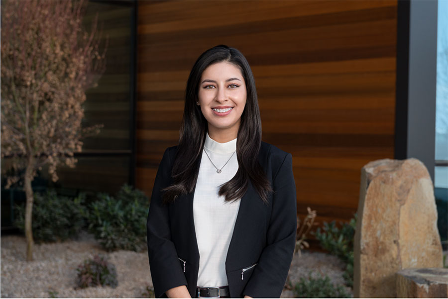 Kaitlin Ramos standing outside in front of a building