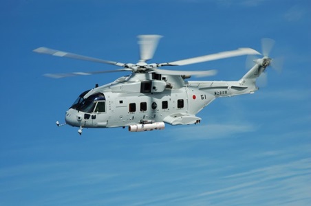 helicopter flying over the ocean