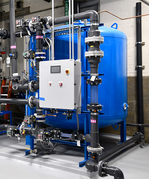 Aquatic Agility: Repurposing Wastewater as an Ultra-Pure Resource – UF and Filtration blue water tank and pipes