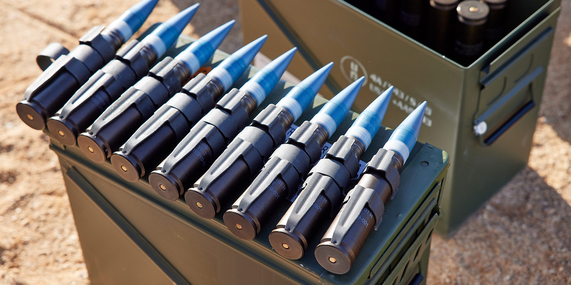 gun ammunition lined up in a row