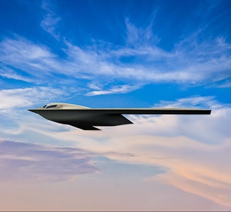 aircraft inflight against cloudy blue sky